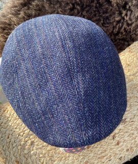 Tweed pet met oorwarmers
